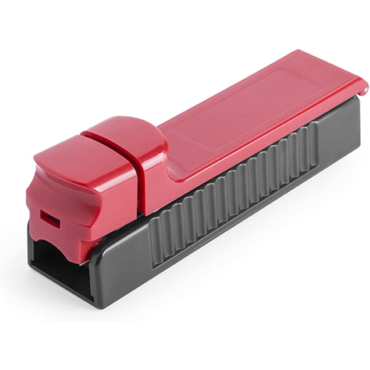 A red and black staple remover with a sleek design and a textured grip surface. It features a compact size for easy handling.