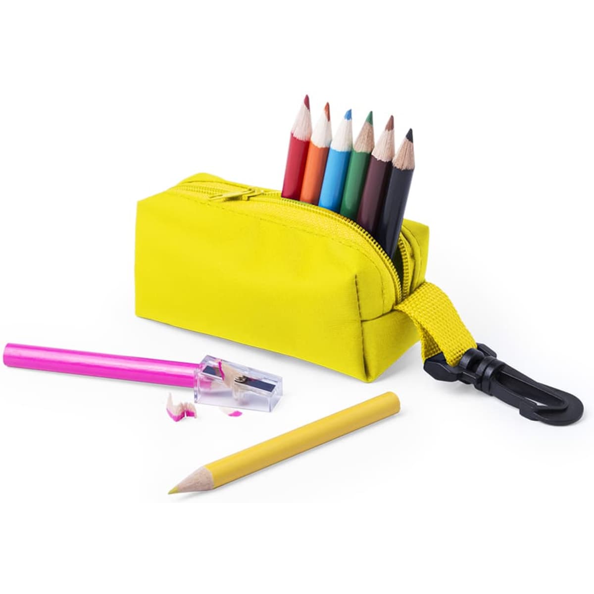 A yellow pencil case containing coloured pencils, with a sharpener and two pencils, one pink and one yellow, nearby.