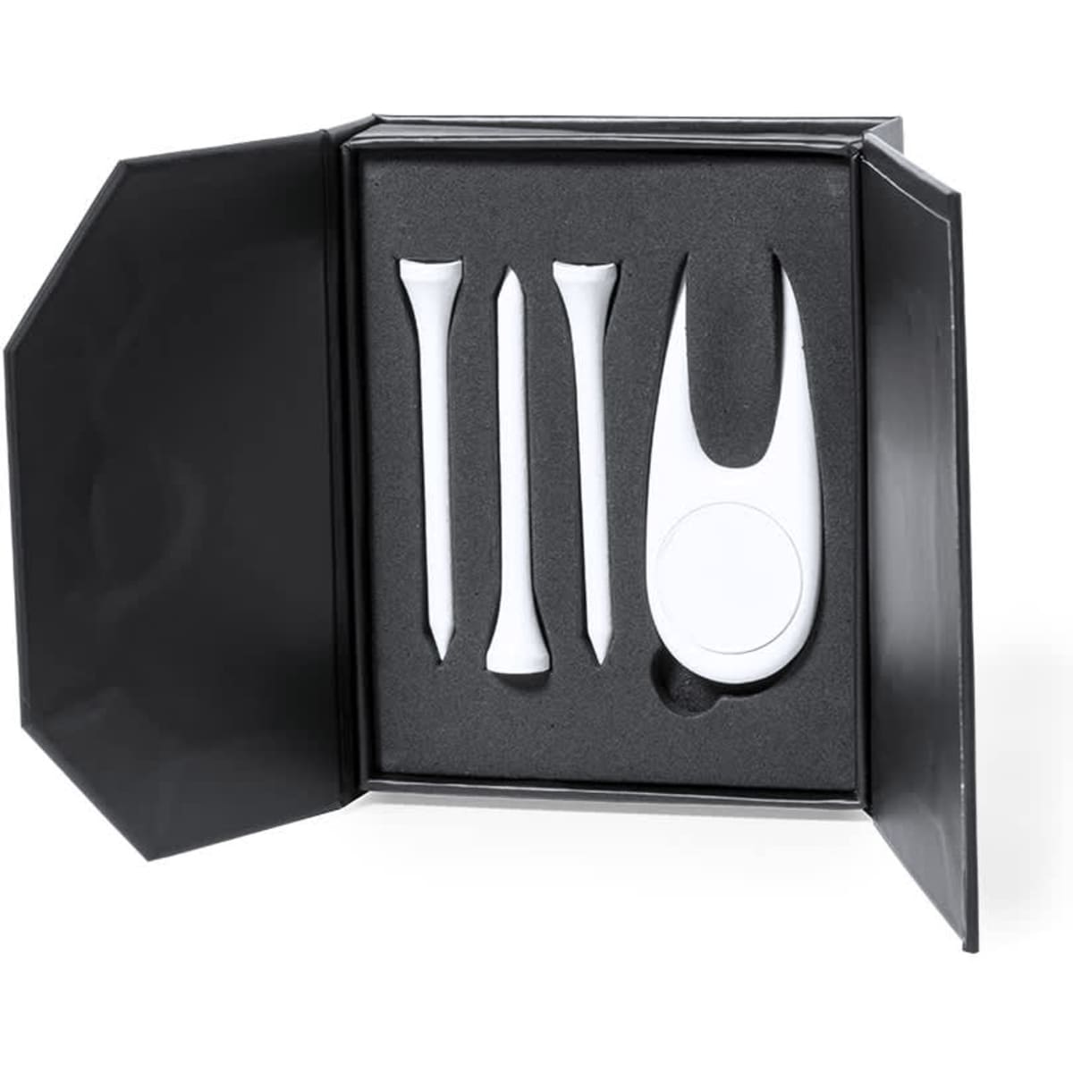 A golf accessory set in a black box, featuring three white tees and a golf marker. The interior is cushioned in black.