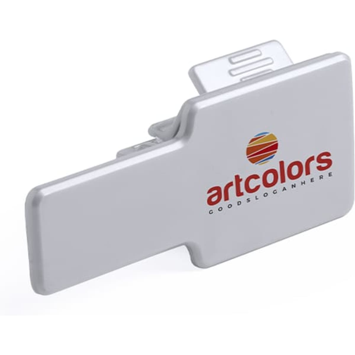 A silver phone stand with a clip design and a logo printed on the front.