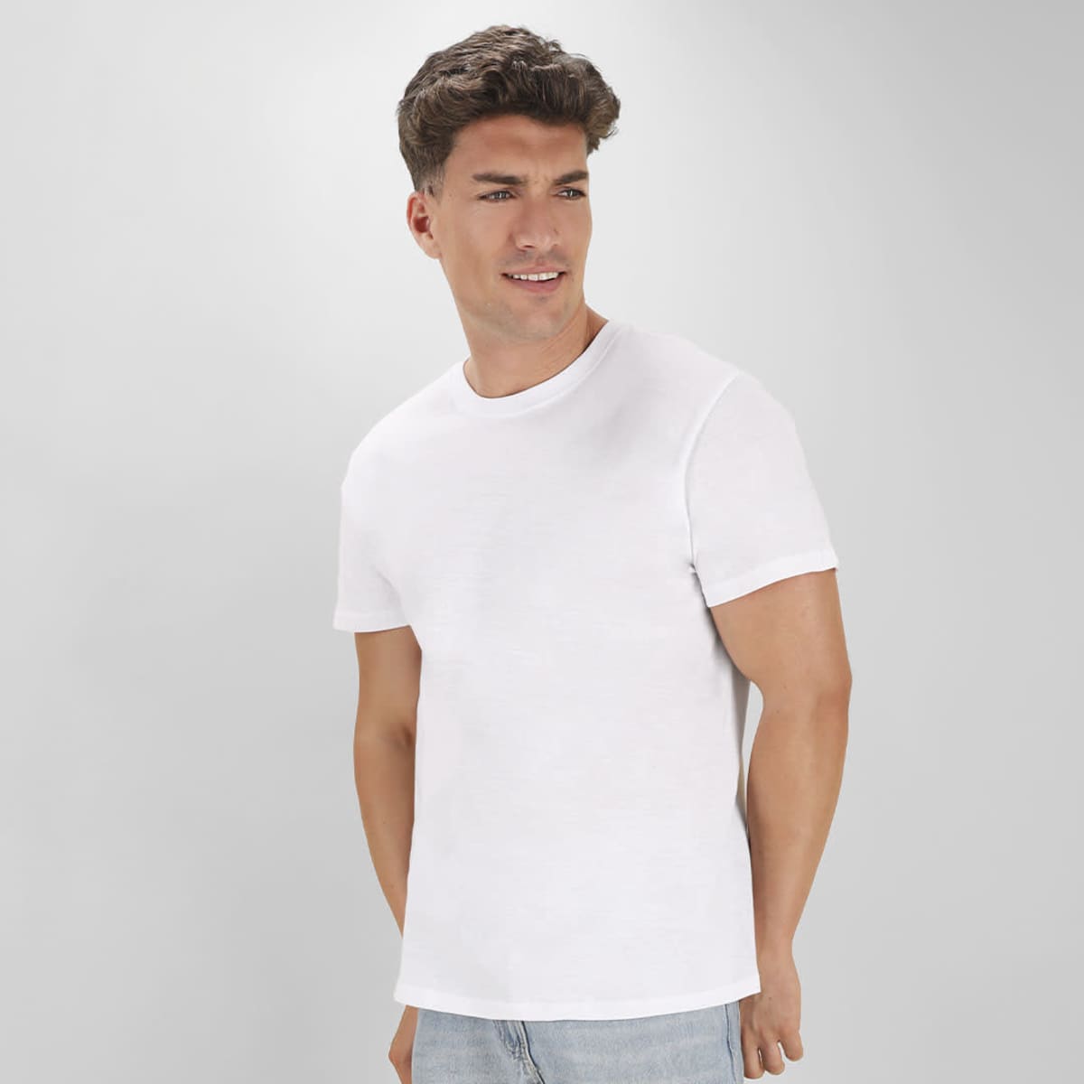 A white t-shirt features a classic crew neck and short sleeves, displayed on a model against a light background.