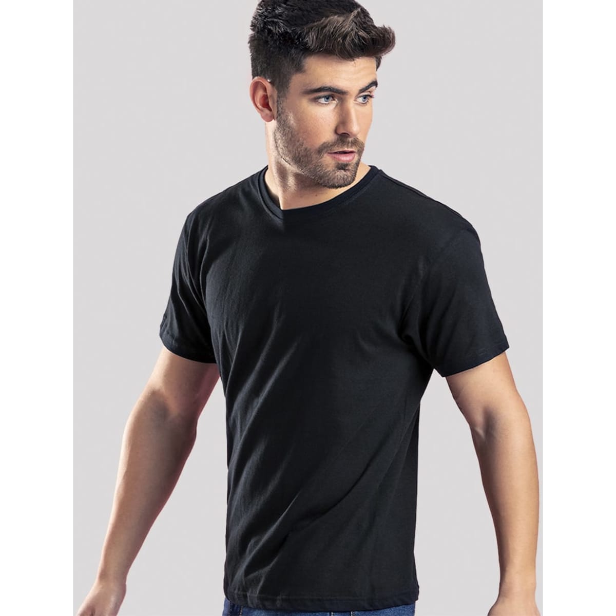 A black T-shirt featuring a plain design and a logo, displayed on a model against a neutral background.