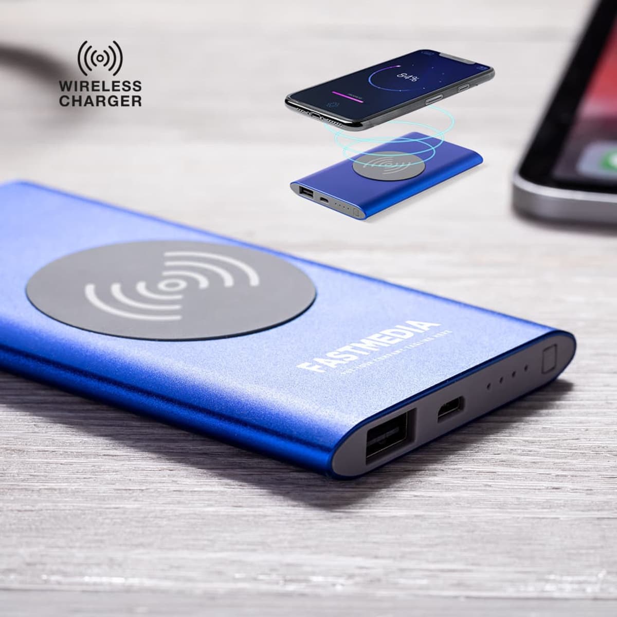 A blue power bank with a wireless charging pad and USB ports, featuring a logo.