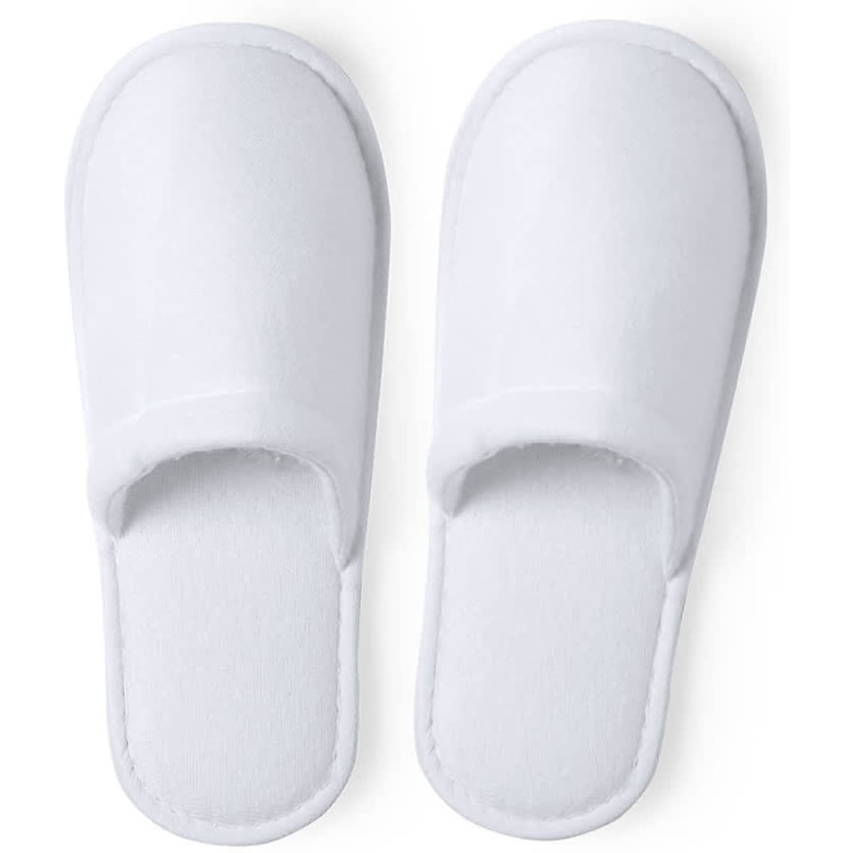 A pair of white, soft slippers with an open toe design, featuring a cushioned footbed and a simple, minimalist style.
