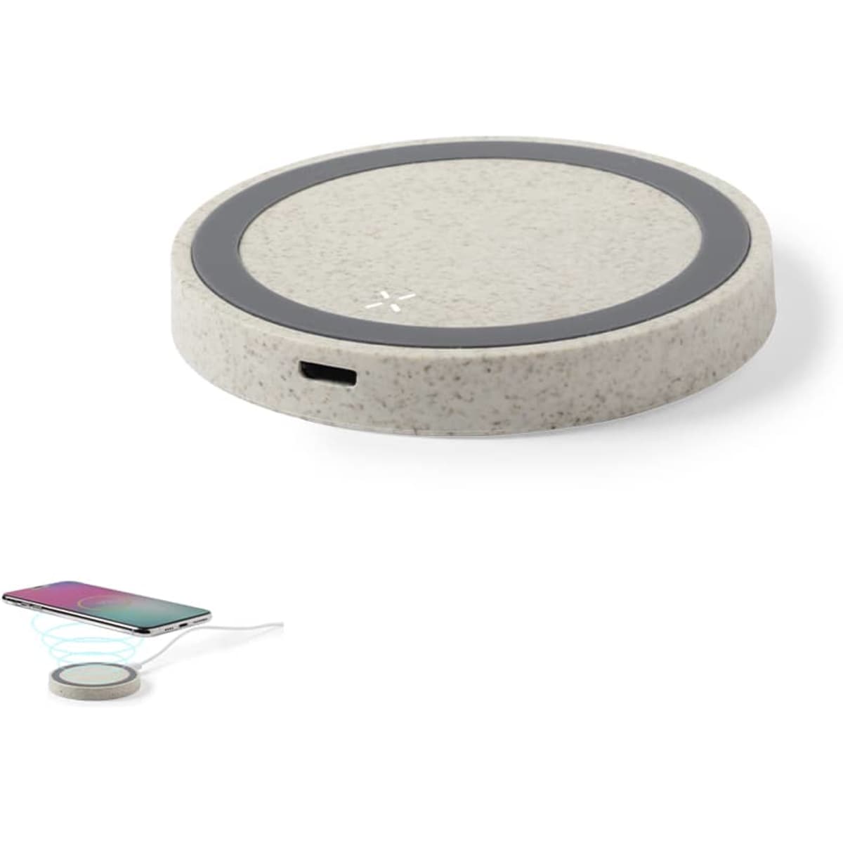 A wireless charger in a light grey finish with a sleek circular design and a logo.