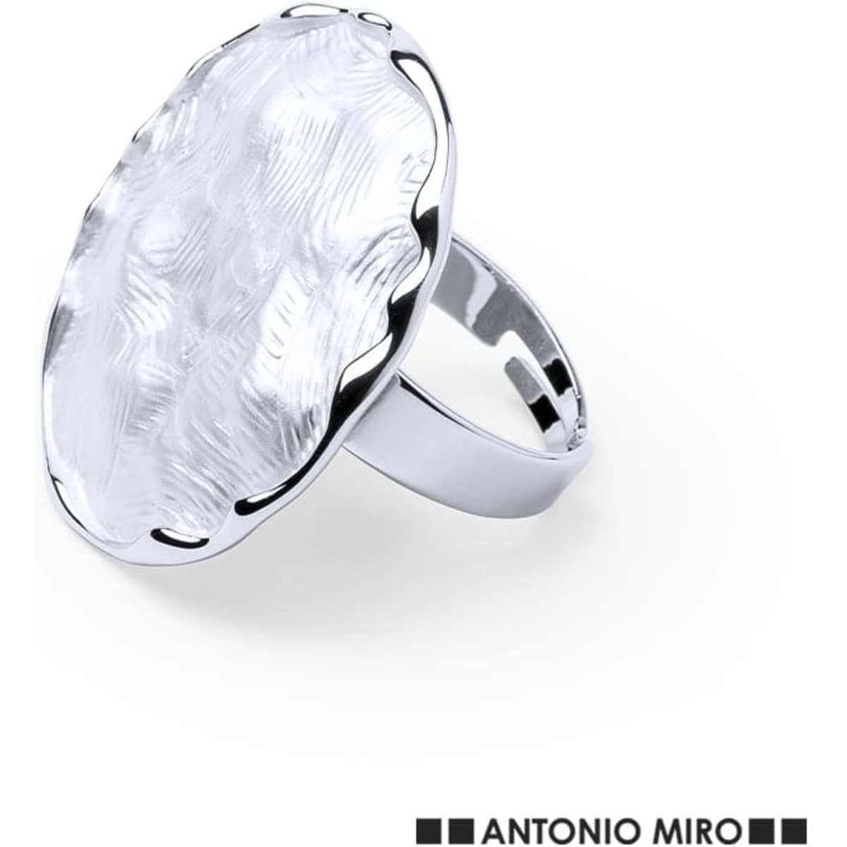 A ring featuring a large, textured transparent oval stone set in a silver band, with branding visible.