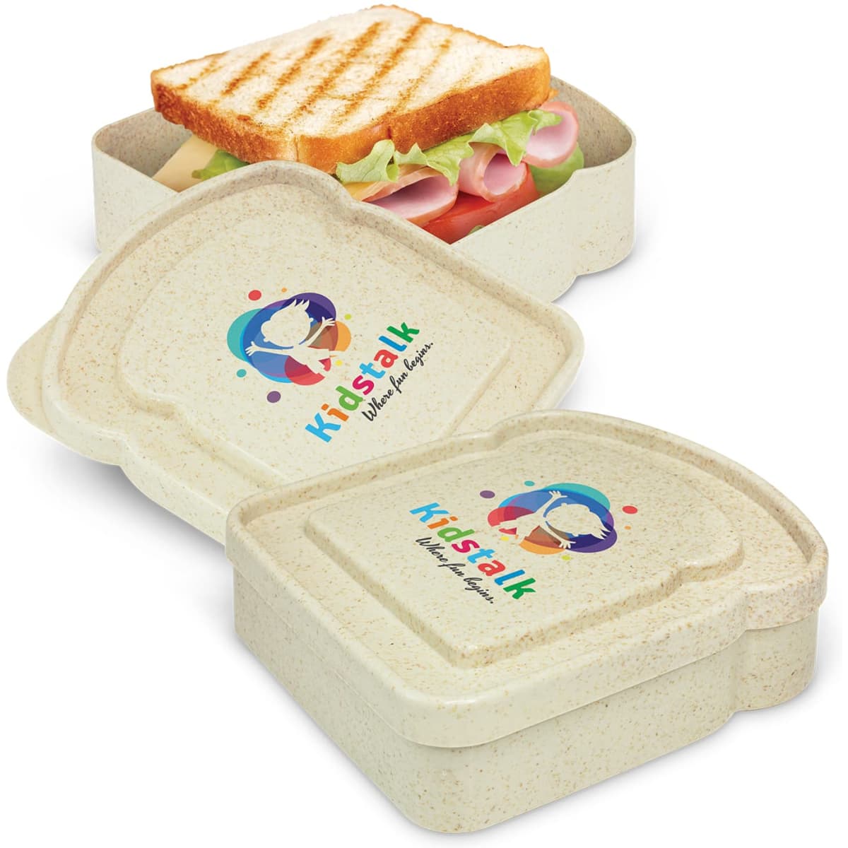 A light beige sandwich box with a logo, containing a sandwich, lettuce, and sliced meats.