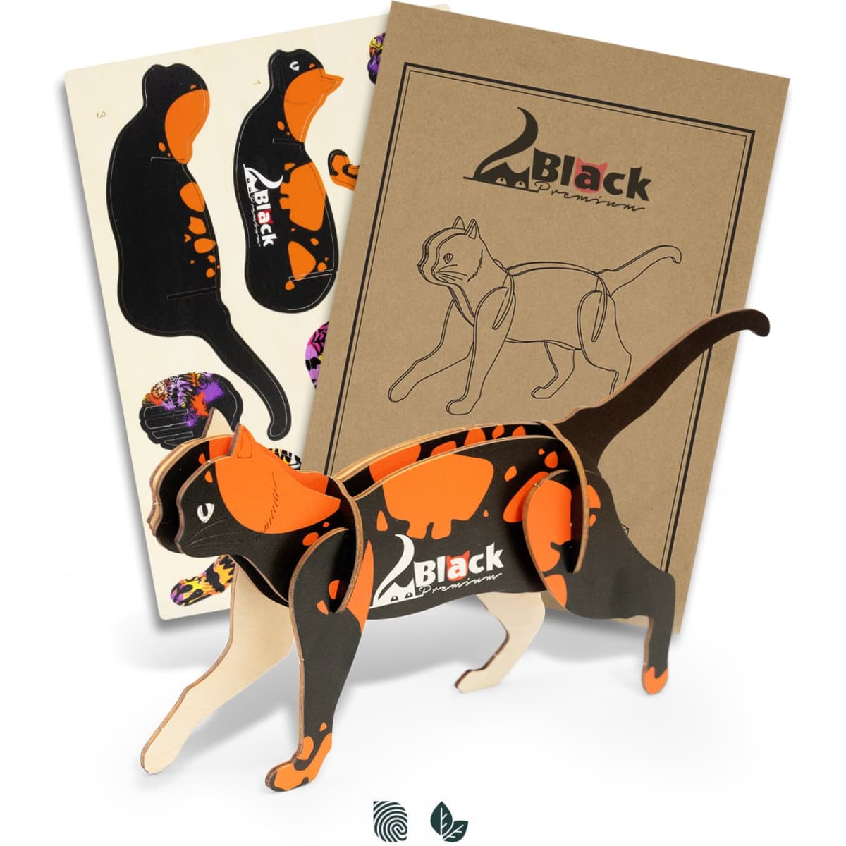 A wooden model of a cat in black and orange, with assembly parts and packaging included.