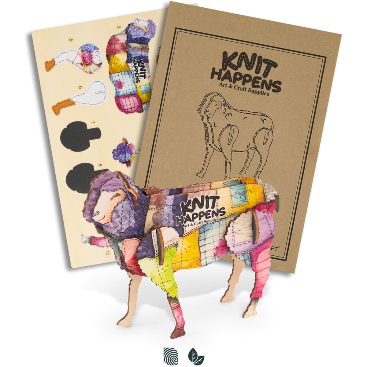 A wooden model of a sheep in vibrant colours, displayed with its packaging and craft supplies for assembly.