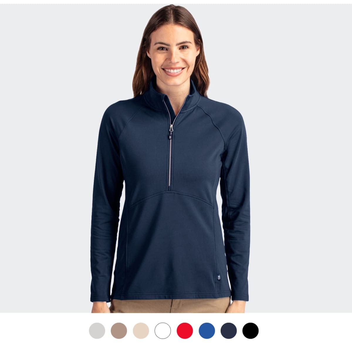 A half-zip women's top in navy blue, featuring long sleeves and a stylish design. Includes a branding logo.