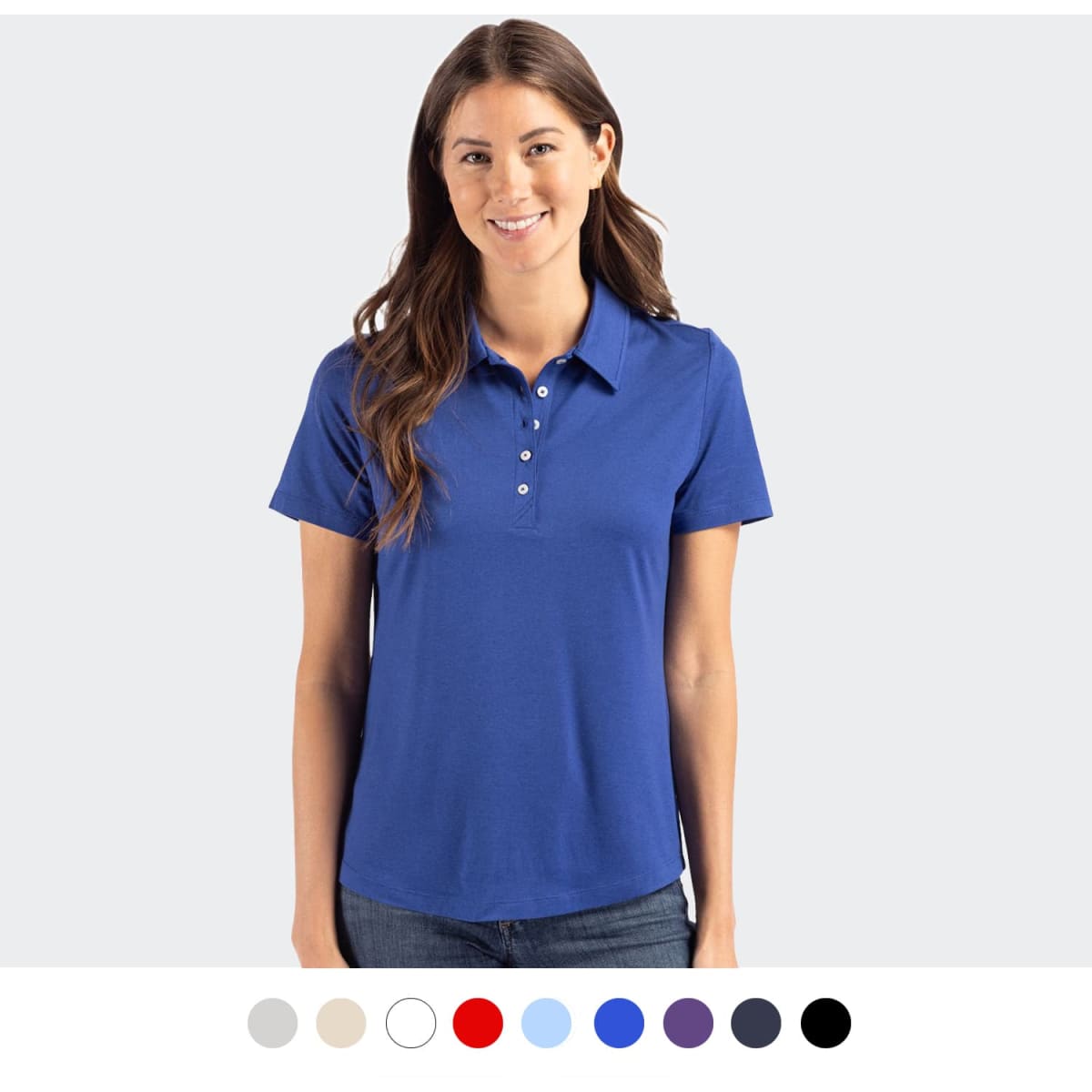 A woman wearing a blue polo shirt with a collar and buttons, featuring a logo on the chest. Multiple colour options below.