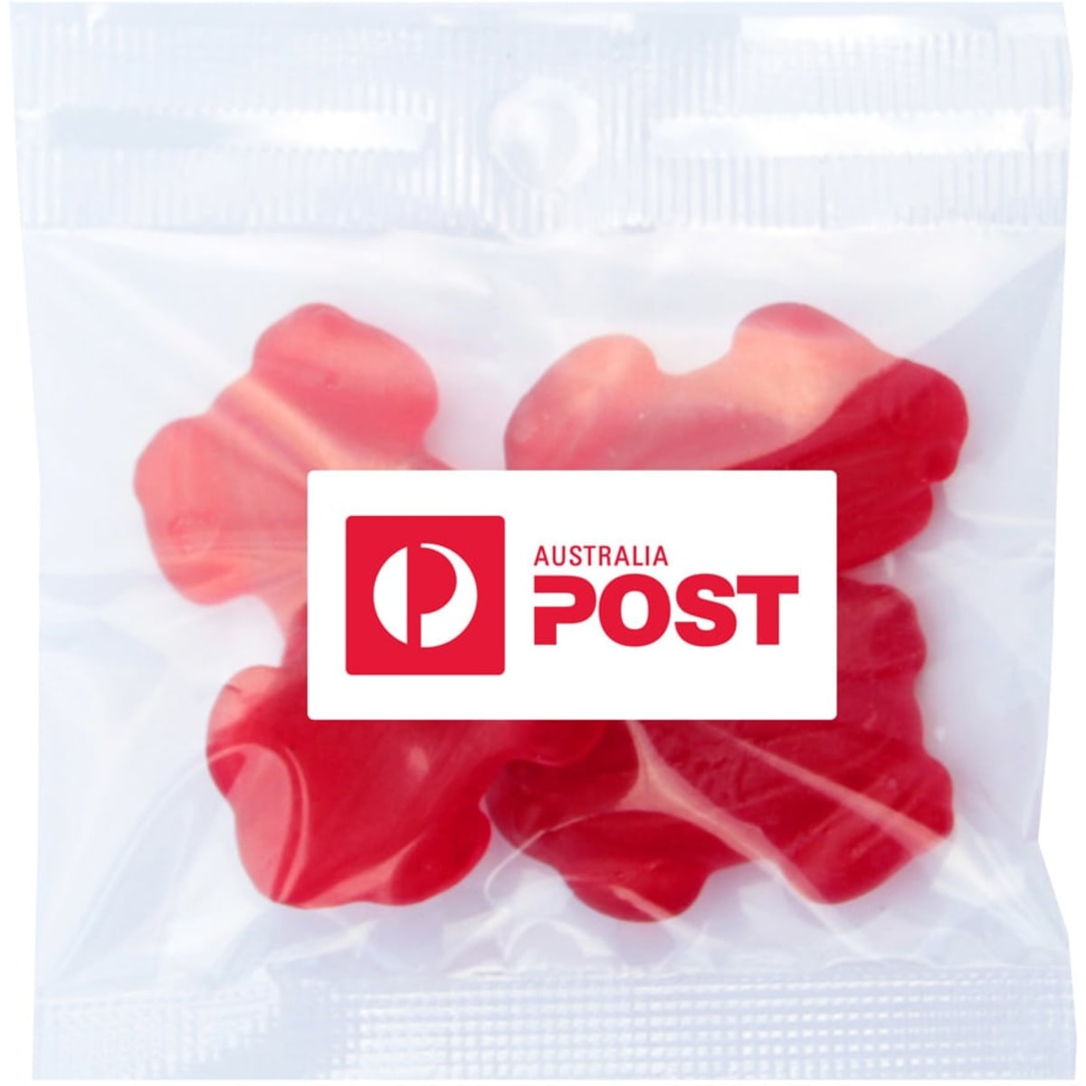 A clear bag containing red gummi lollies shaped like frogs. The bag has a logo.