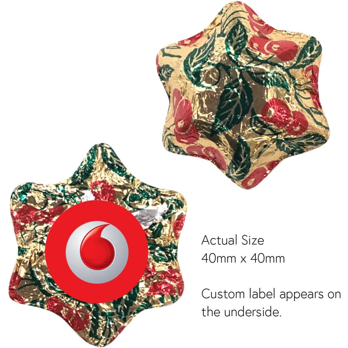 A gold, star-shaped decoration with red and green floral patterns. It has a logo on the underside.