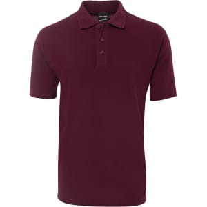 A burgundy polo shirt with a collared neckline and three-button placket. It features a logo on the fabric.