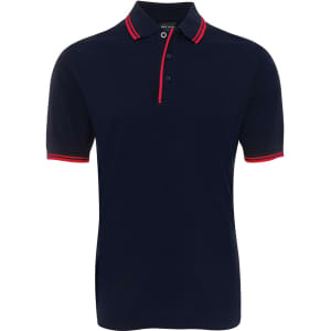 A navy polo shirt with contrasting red stripes on the collar and sleeve cuffs. It features a button-up front and a logo.