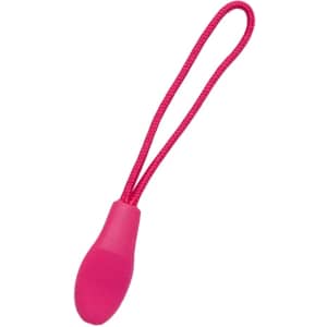 A pink changeable zip puller with a textured grip and a loop for easy attachment.