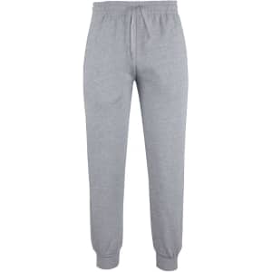 Light grey track pants with a drawstring waistband and cuffs at the ankles, featuring a branding logo.