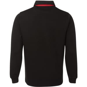 A two-tone black rugby shirt with a red collar, featuring long sleeves and a logo on the front.