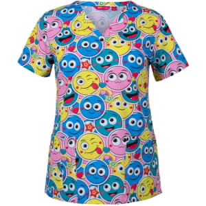 A colourful scrub top featuring a playful pattern of various smiley faces in pink, blue, and yellow. Includes a logo.