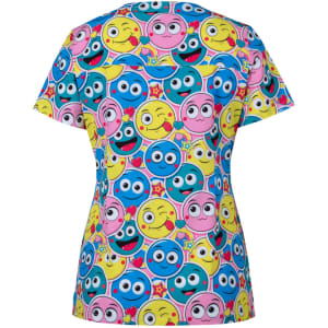 A printed scrub top featuring a vibrant design of multicoloured smiley faces in pink, yellow, and blue.
