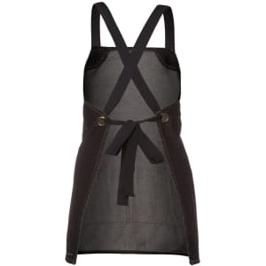 A black denim bib apron with a cross-back design and a tied waist. Features logo branding.