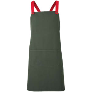 A green canvas apron with red cross-back straps and a front pocket. It features a logo on the design.