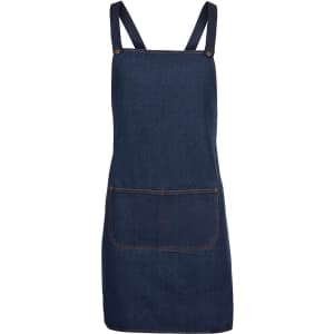 A navy denim cross back apron featuring adjustable straps and a front pocket. It has a simple design and a branded logo.