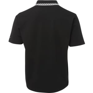 A black polo shirt featuring a white checkered collar and a branded logo on the sleeve, designed for chef wear.