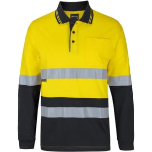A long-sleeve cotton polo in bright yellow with grey reflective stripes and a black lower section. It features a chest pocket and branding.