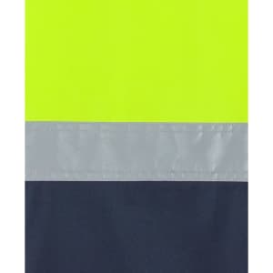 A close-up of a safety garment featuring bright lime and navy colours with reflective tape.
