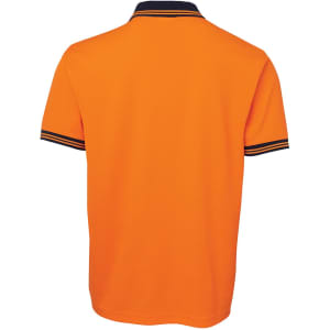 An orange polo shirt featuring a navy collar and striped cuffs, with a logo on the side.