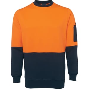 An orange and navy work jumper featuring a pocket and a logo on the sleeve.