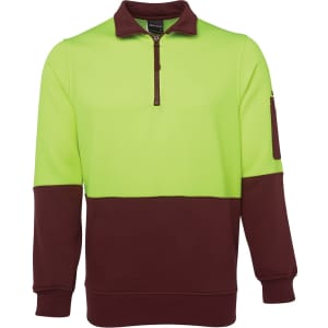 A high-visibility polar fleece in bright green and brown, featuring a zippered neck and a side pocket.