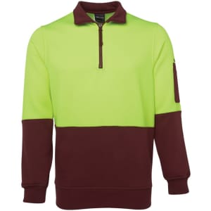 A bright yellow-green and brown polar fleece with a half zip and a sleeve pocket, featuring a logo.