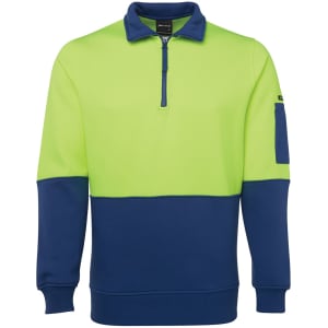 A polar fleece top featuring a half zip, with a bright green upper and navy blue lower section. Includes a pocket.