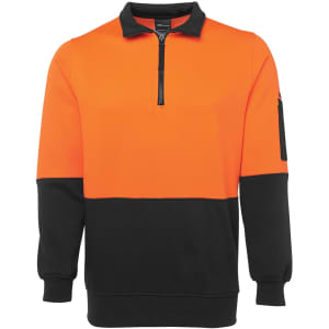 A half-zip polar fleece in orange and black with a pocket and a logo on the sleeve.