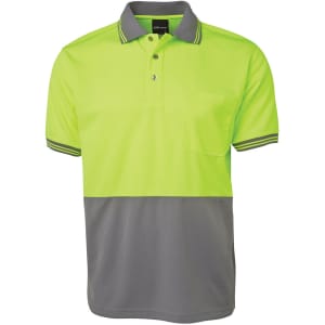 A short-sleeved polo shirt in high visibility lime green with grey accents and a left chest pocket. It features a logo.