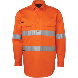 An orange long-sleeve work shirt featuring reflective silver stripes and two chest pockets, with a logo.