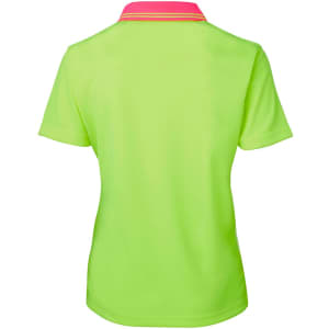 A vibrant lime green ladies polo shirt featuring a contrasting pink collar and a logo on the back.