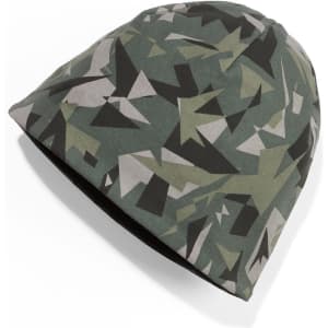 A green and grey patterned knitted beanie with a logo on the side.