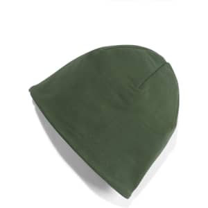 A green knitted beanie, featuring a simple design and a subtle logo, laying flat on a white background.