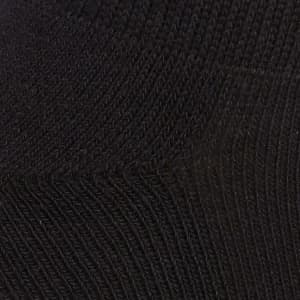 A black ankle sock featuring a textured pattern, part of a five-pack set. Includes branding on the sock.