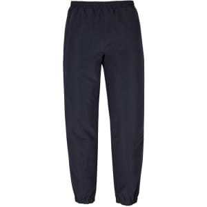 Track pants in navy blue with an elasticised waistband and cuffs. Features a logo on the leg.
