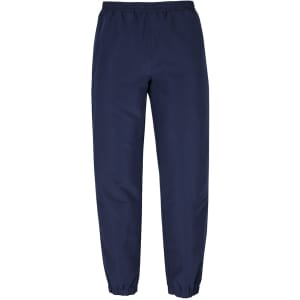 Navy track pants with an elastic waistband and tapered cuffs, featuring a logo on the side.