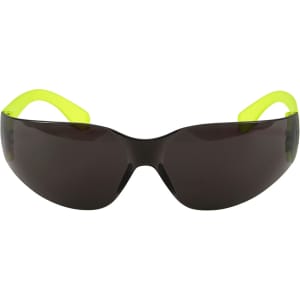 Sunglasses with dark lenses and bright yellow arms, featuring a logo on the temple. Suitable for outdoor activities.