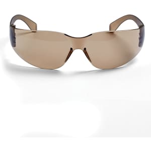 A pair of sunglasses with a brown tint and sleek design, featuring a logo on the side.