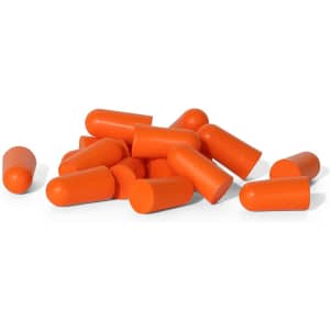 A pile of orange bullet-shaped earplugs, showcasing their smooth surface and rounded ends.
