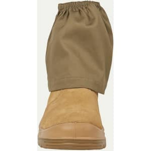 A tan boot with a khaki boot cover secured at the top. The cover features an elasticised opening.