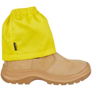 A boot cover in bright yellow fabric, designed to fit over a tan safety boot. It has an elasticated top and a logo.