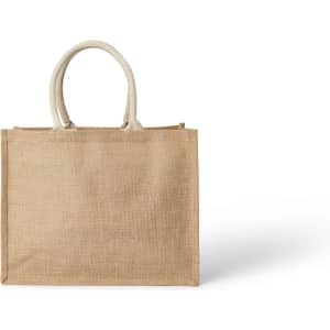 A natural jute tote bag with sturdy handles, featuring a plain, textured surface and no visible branding.